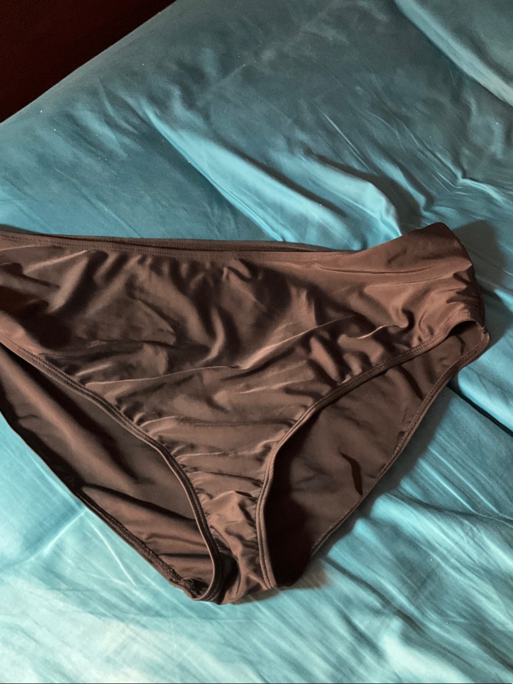 Woman’s black swim bottoms